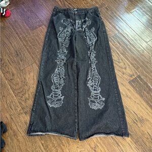 Minga Black Wide-Leg Jeans with Faded Skeleton Print